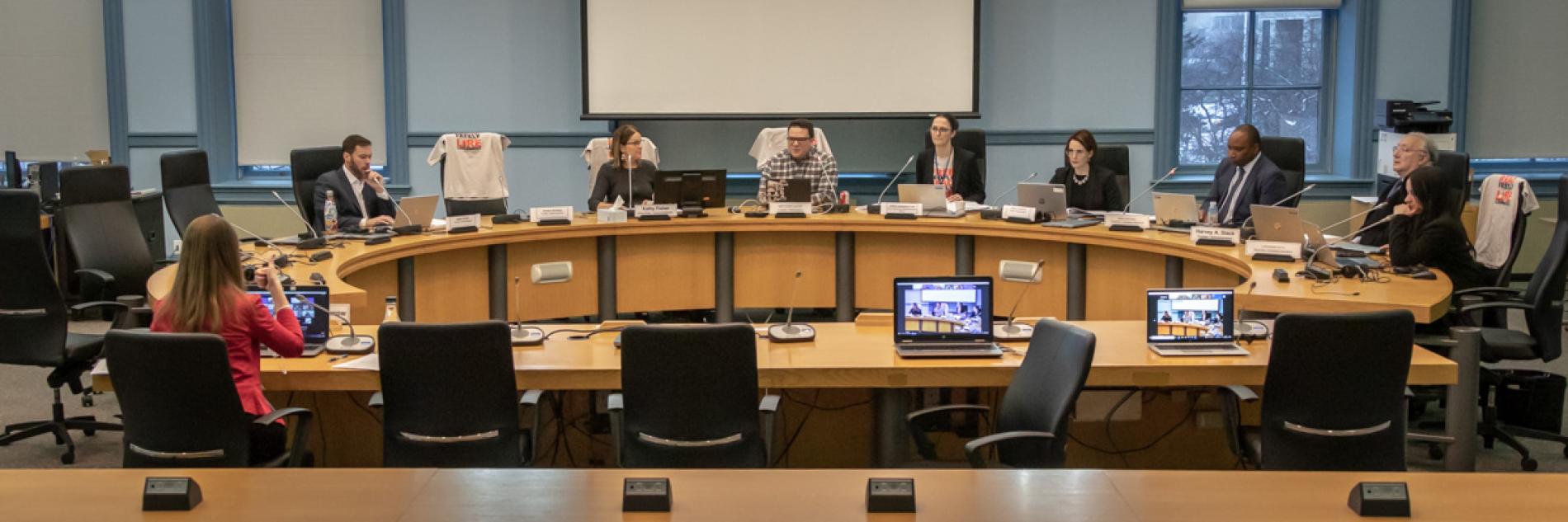 Round board table and chairs at Col. By Room in City Hall